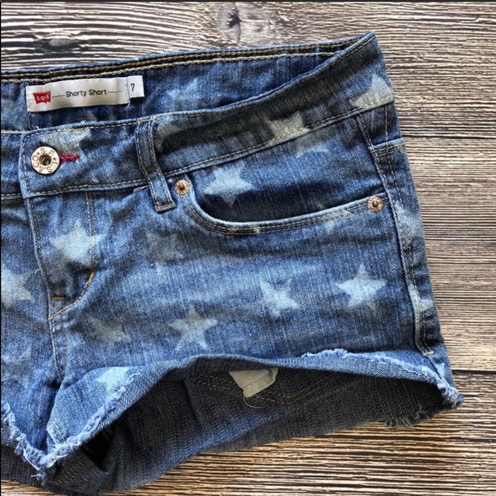 Levi's Shorty Shorts denim stars fringed hems sz 7 - Picture 2 of 8